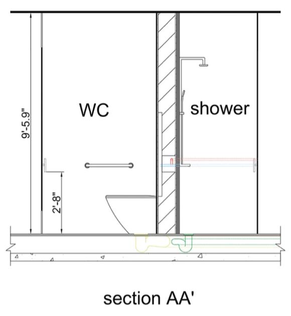 Section AA′ through a WC and shower cubicle, drawn at 1:20 with a 9′-5.9″ clear height and a 2′-8″ grab-rail height.